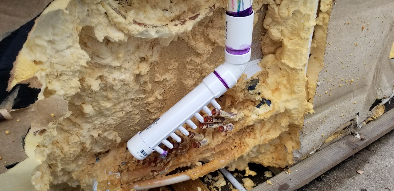 Replacement manifold installed in the hot tub