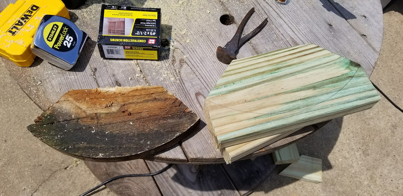 Old curved corner frame piece used as a template