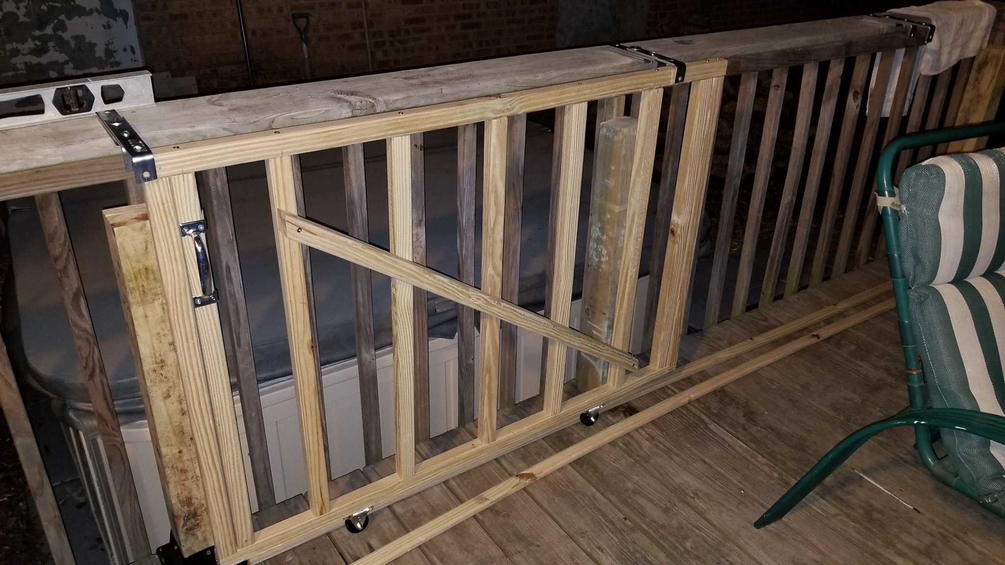 Sliding gate hardware and track installed