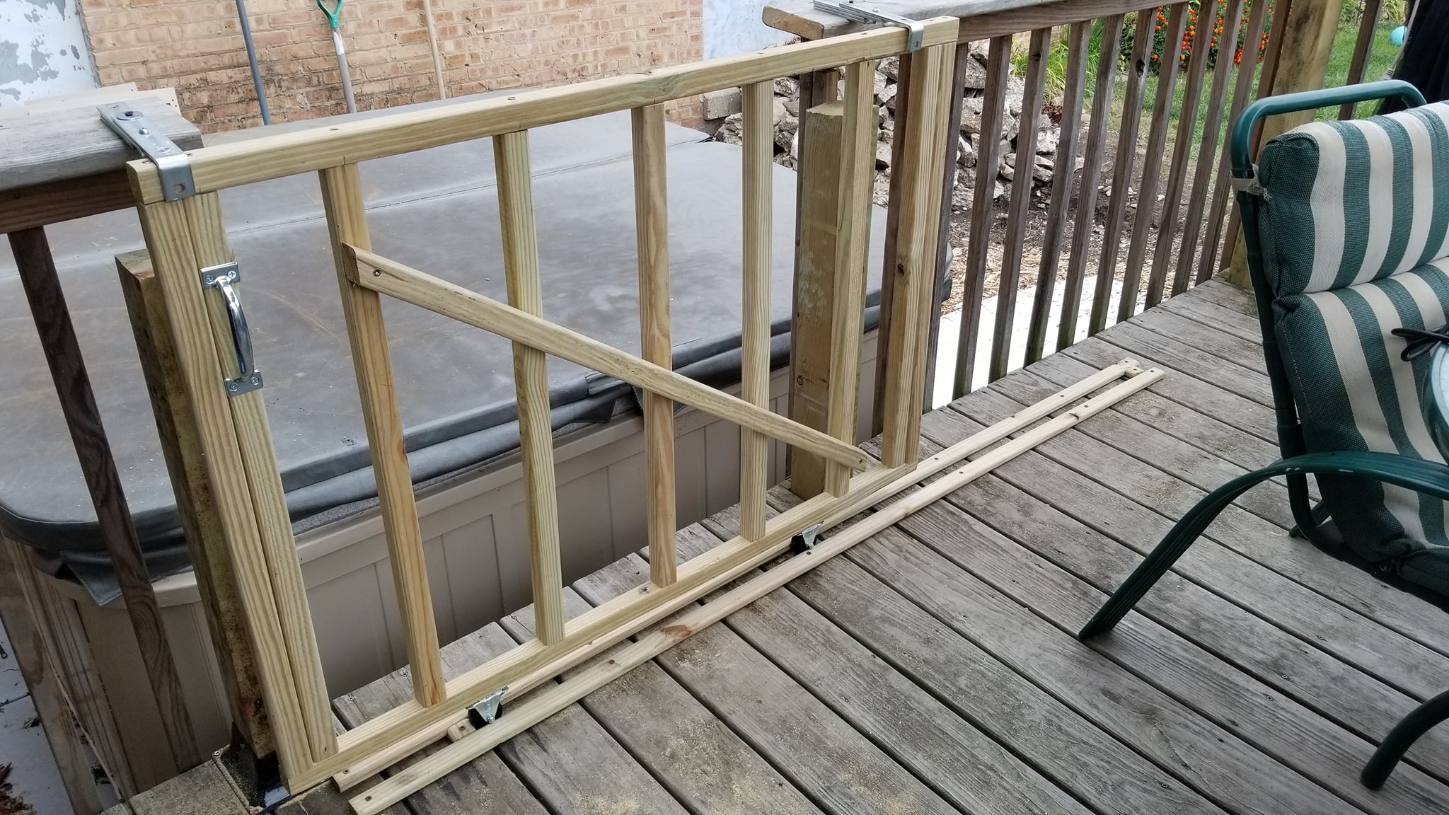 Deck railing removed to create direct hot tub access