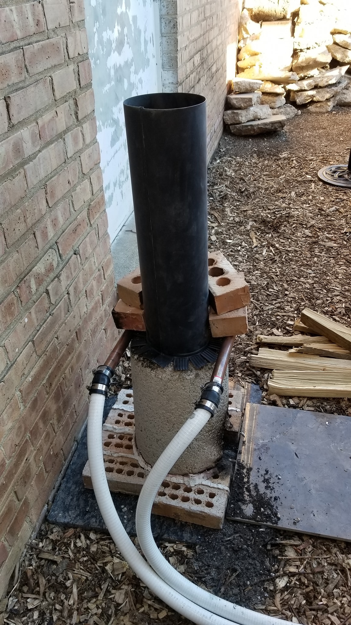 Rocket heater with taller chimney installed