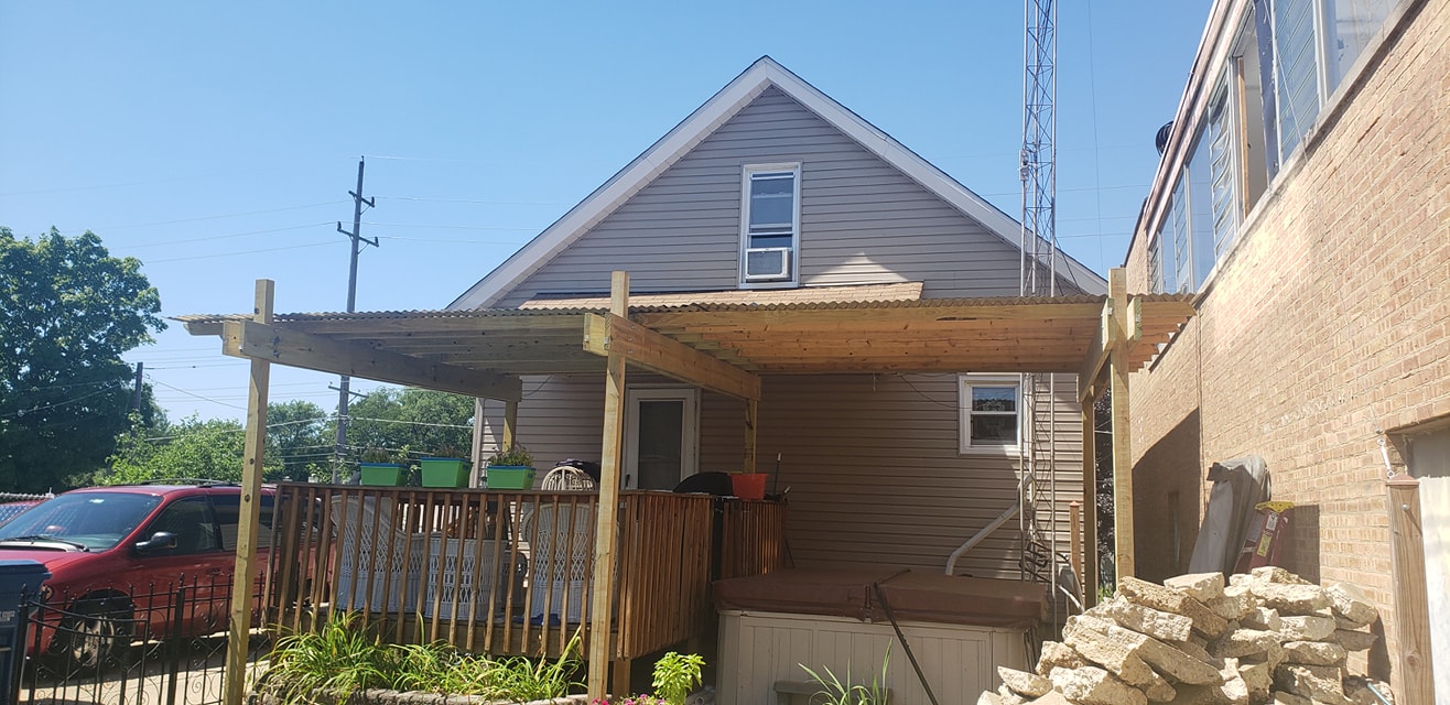 Completed pergola structure viewed from the backyard