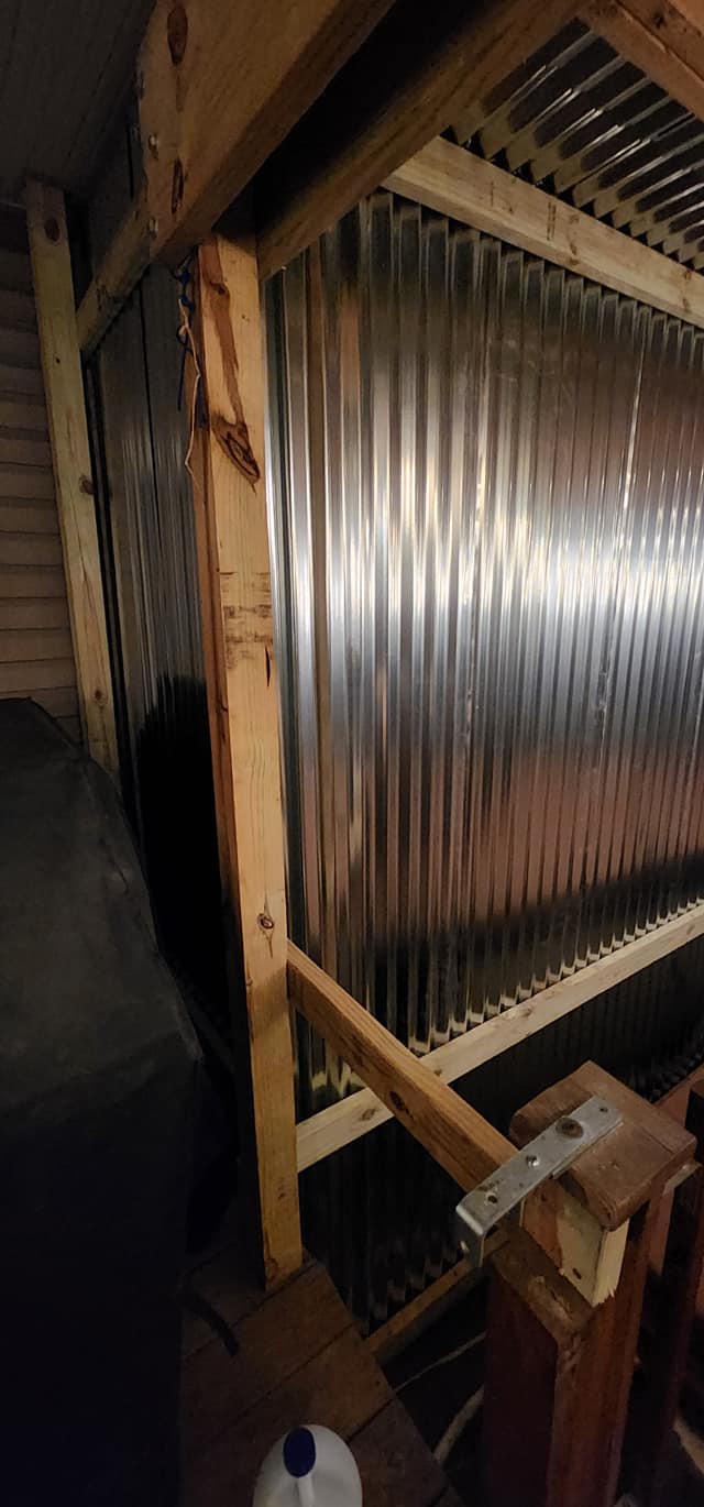 Metal wall panels being installed