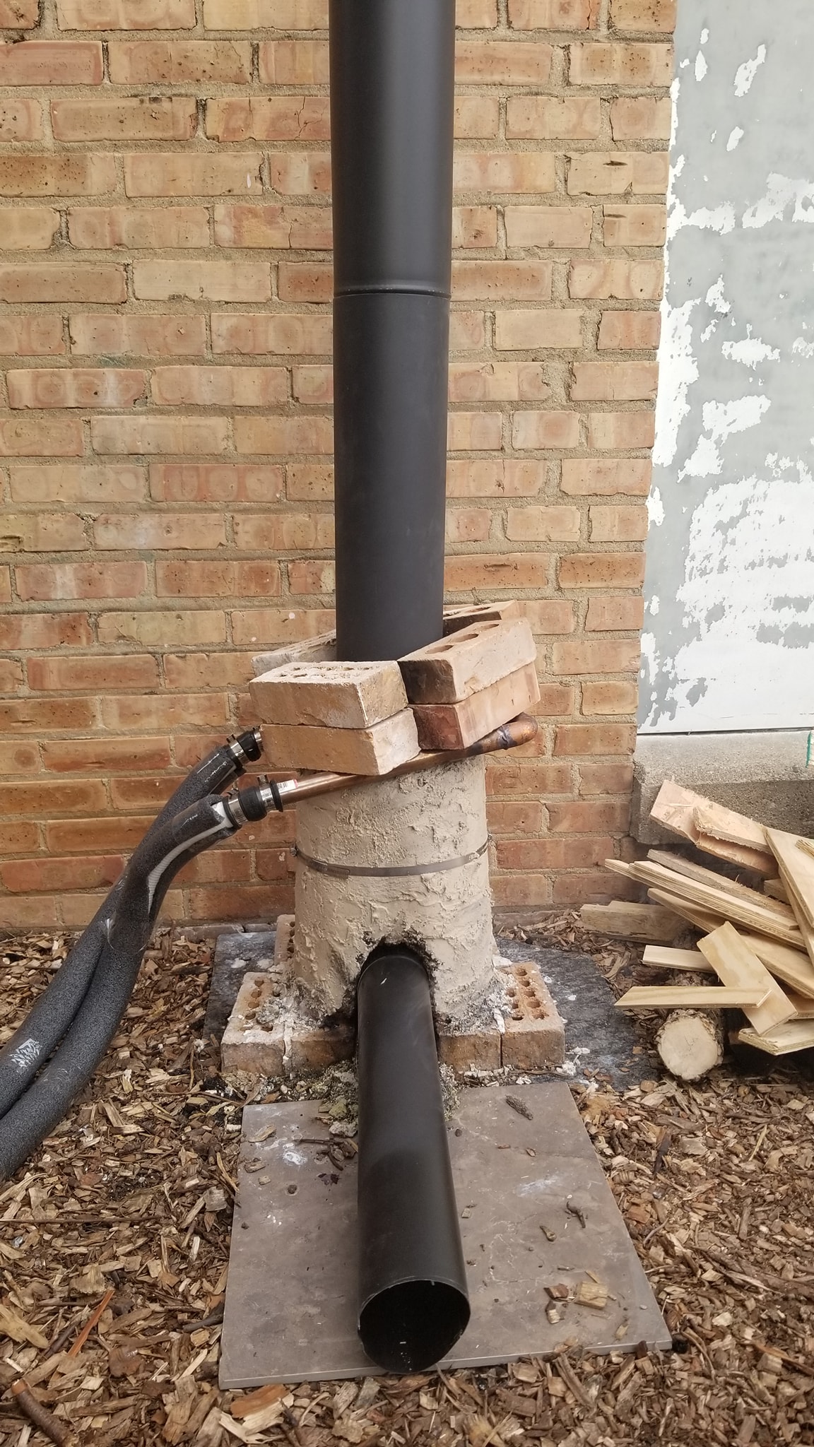 Rocket heater with extended feed tube