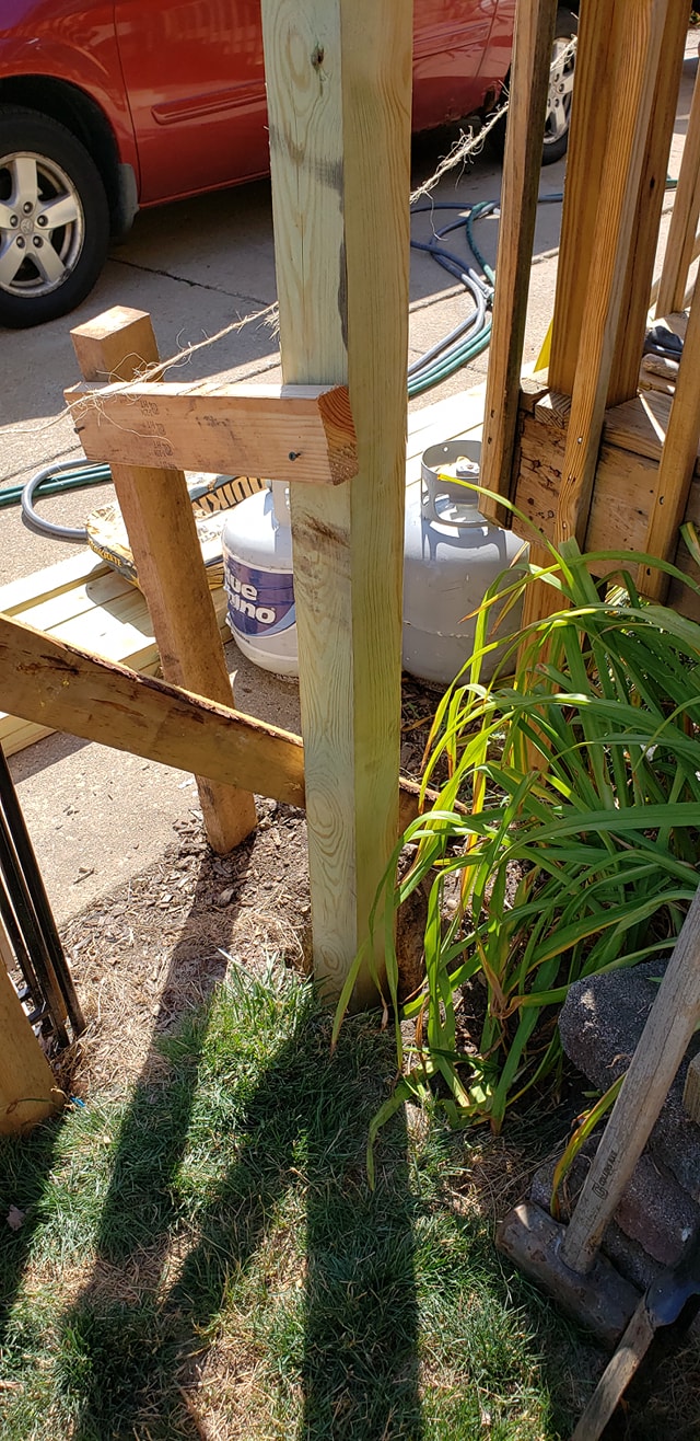 New 4x4 post being installed